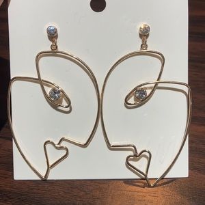 H&M Face shaped earrings